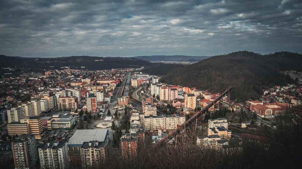 The city including the funicular and the Barzava river.